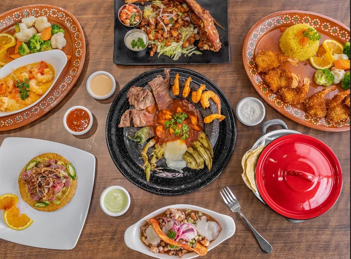 Table full of Los Toxicos dishes